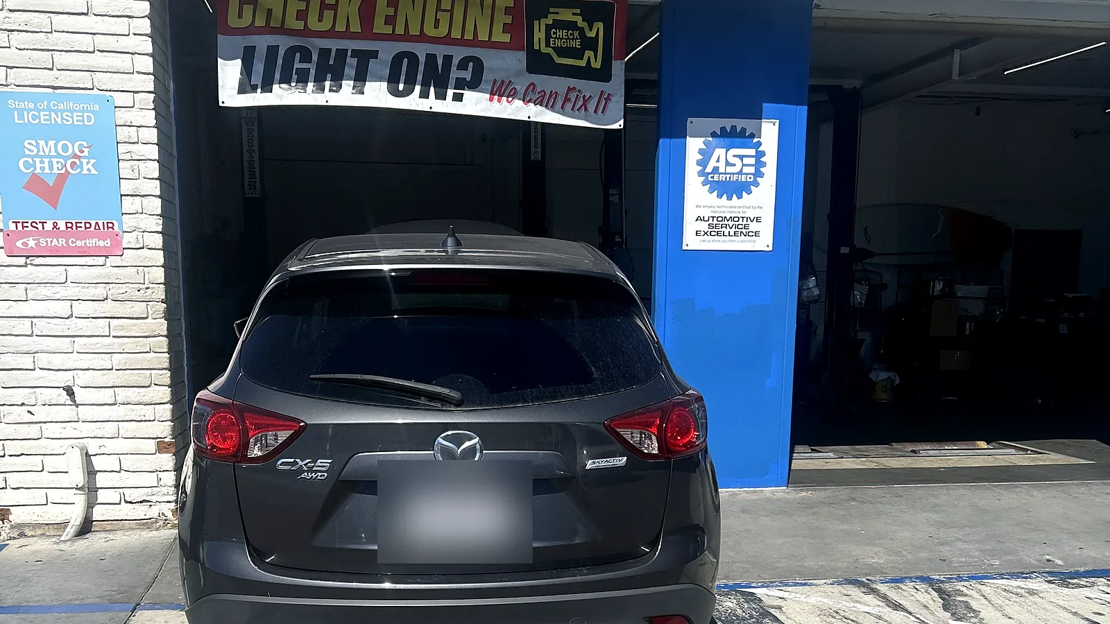 Auto A/C repair in Encinitas, CA: Mazda CX-5 pulled up to our service bay