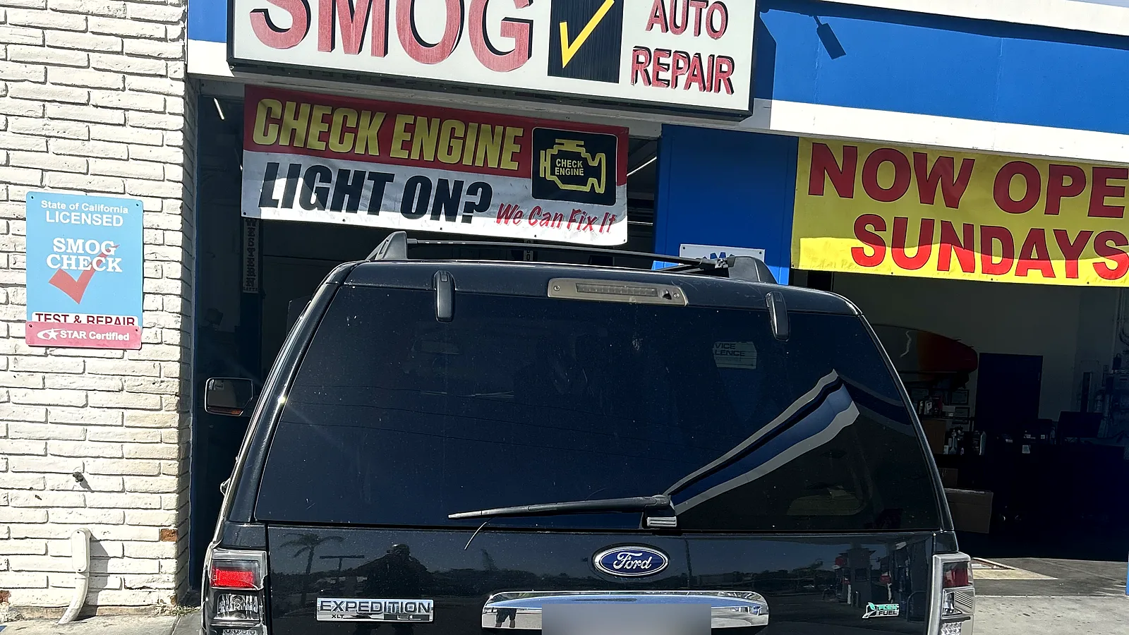 Brake repair in Encinitas, CA: Ford Expedition pulled up to our service bay