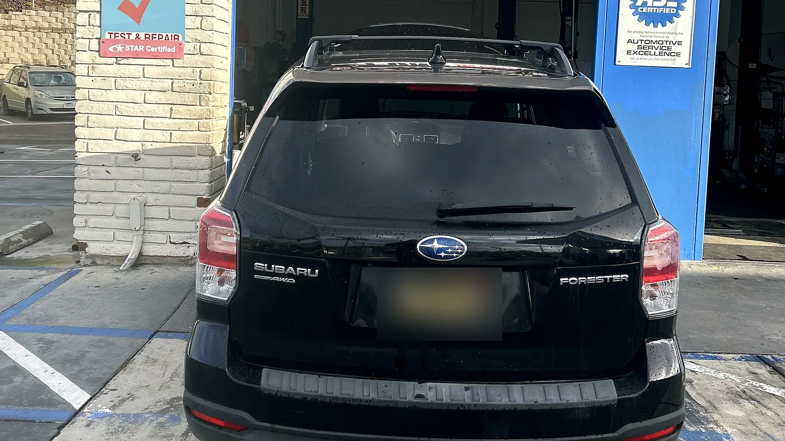 Change-of-ownership smog check in Encinitas, CA: Subaru at our service bay