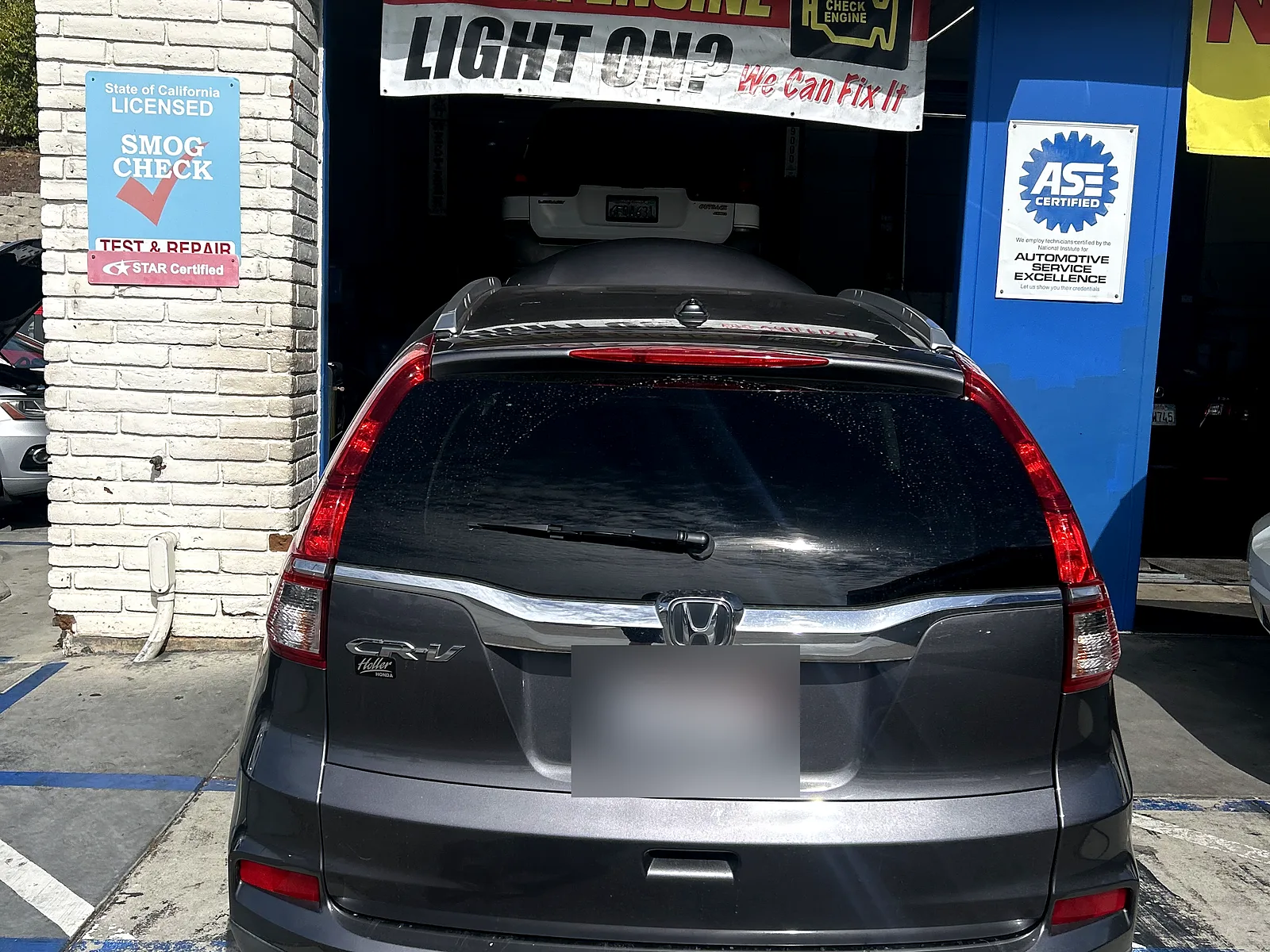Oil change in Encinitas, CA: Honda SUV at our service bay