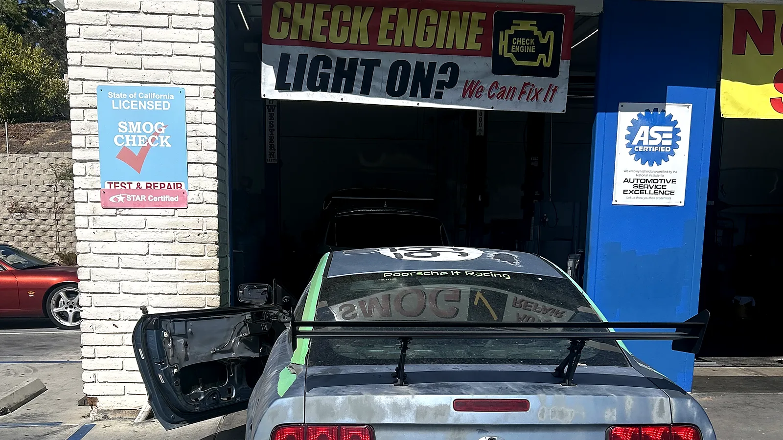 Oil change in Encinitas, CA: Ford Mustang pulled up to our service bay