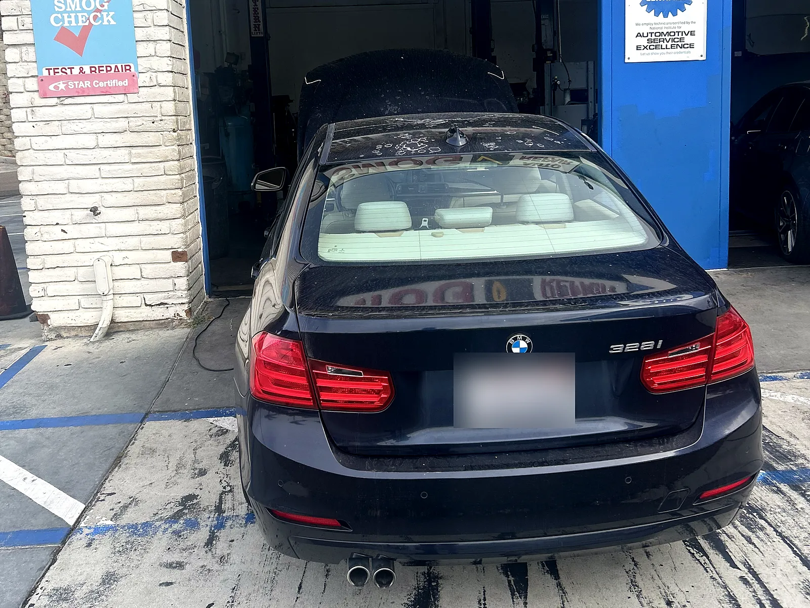 Out-of-state vehicle smog check in Encinitas, CA: BMW 3 Series sedan at our service bay