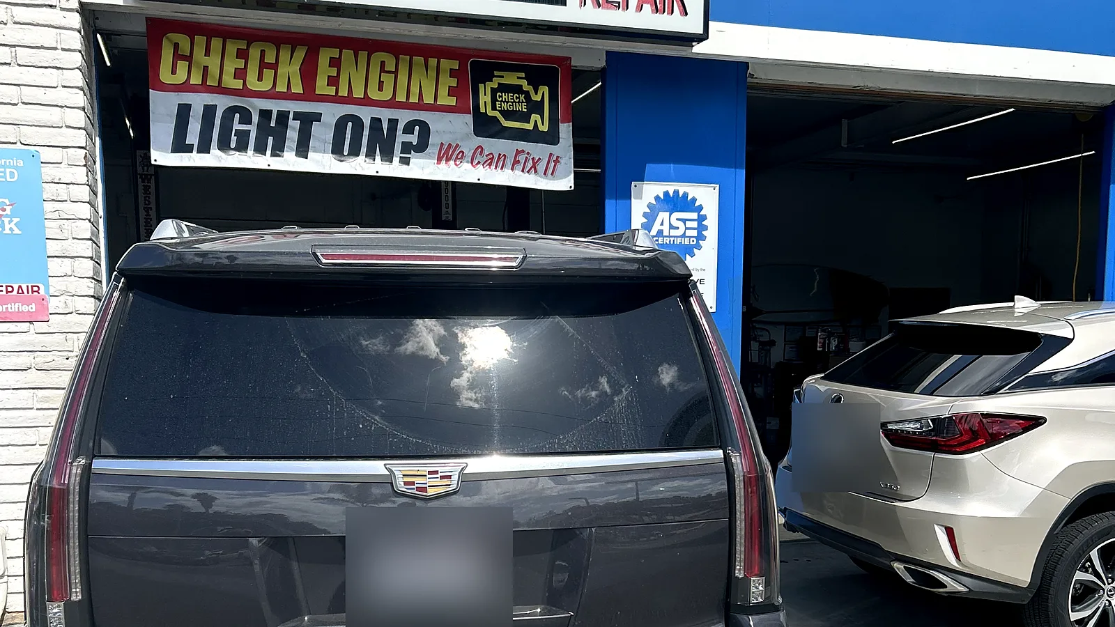 Radiator repair in Encinitas, CA: Cadillac Escalade pulled up to our service bay