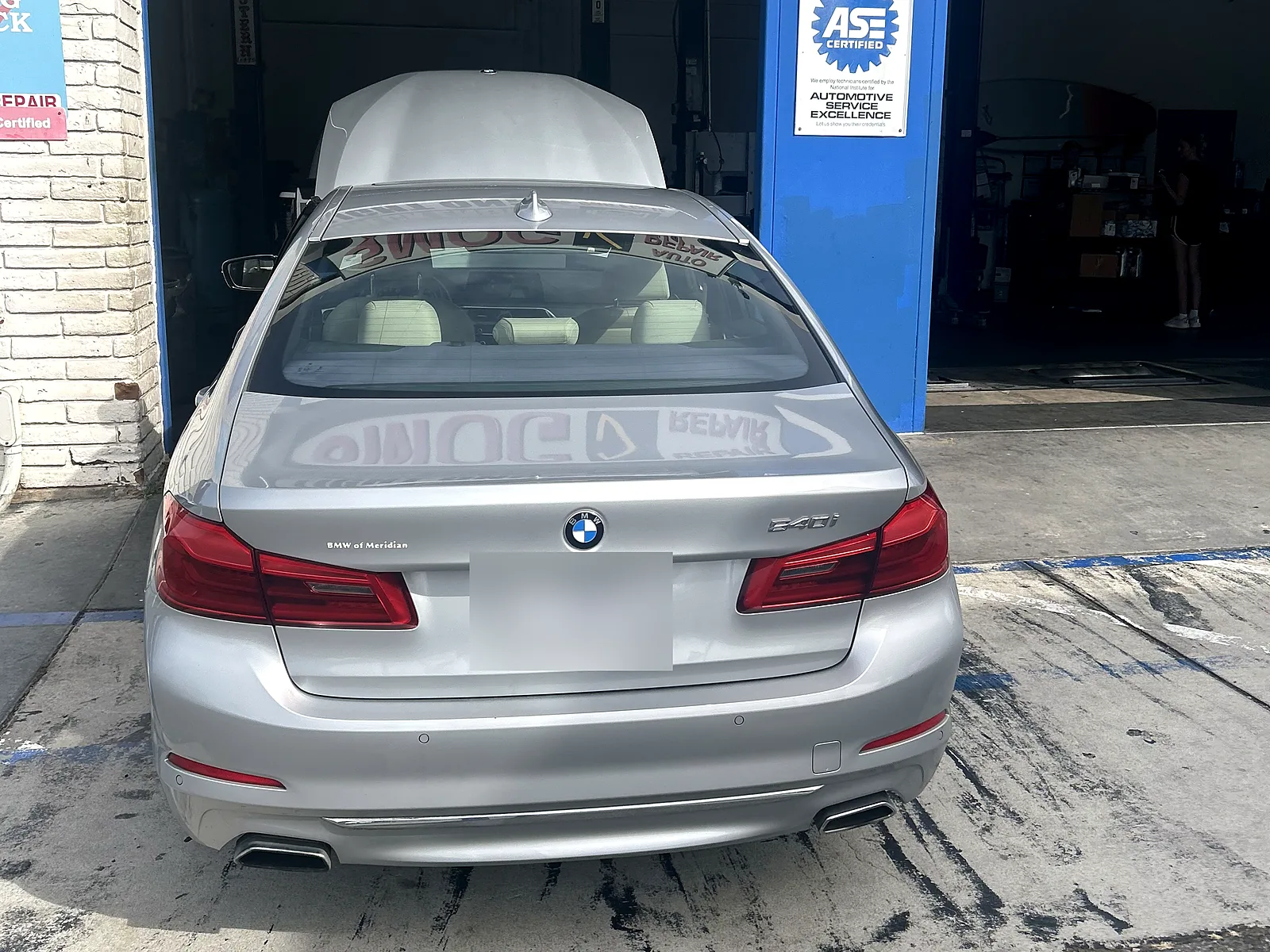 Smog retest in Encinitas, CA: BMW 5 Series sedan at our service bay