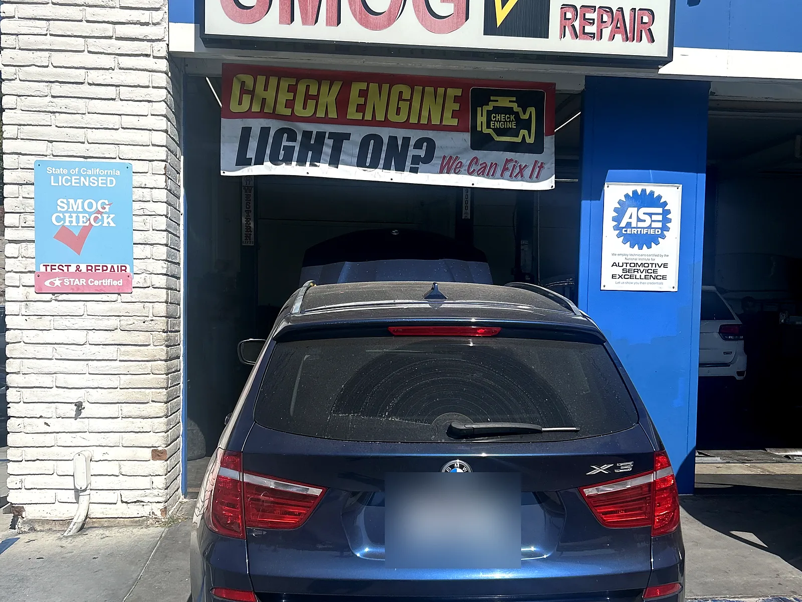 Suspension and steering repair in Encinitas, CA: BMW X3 at our bay door