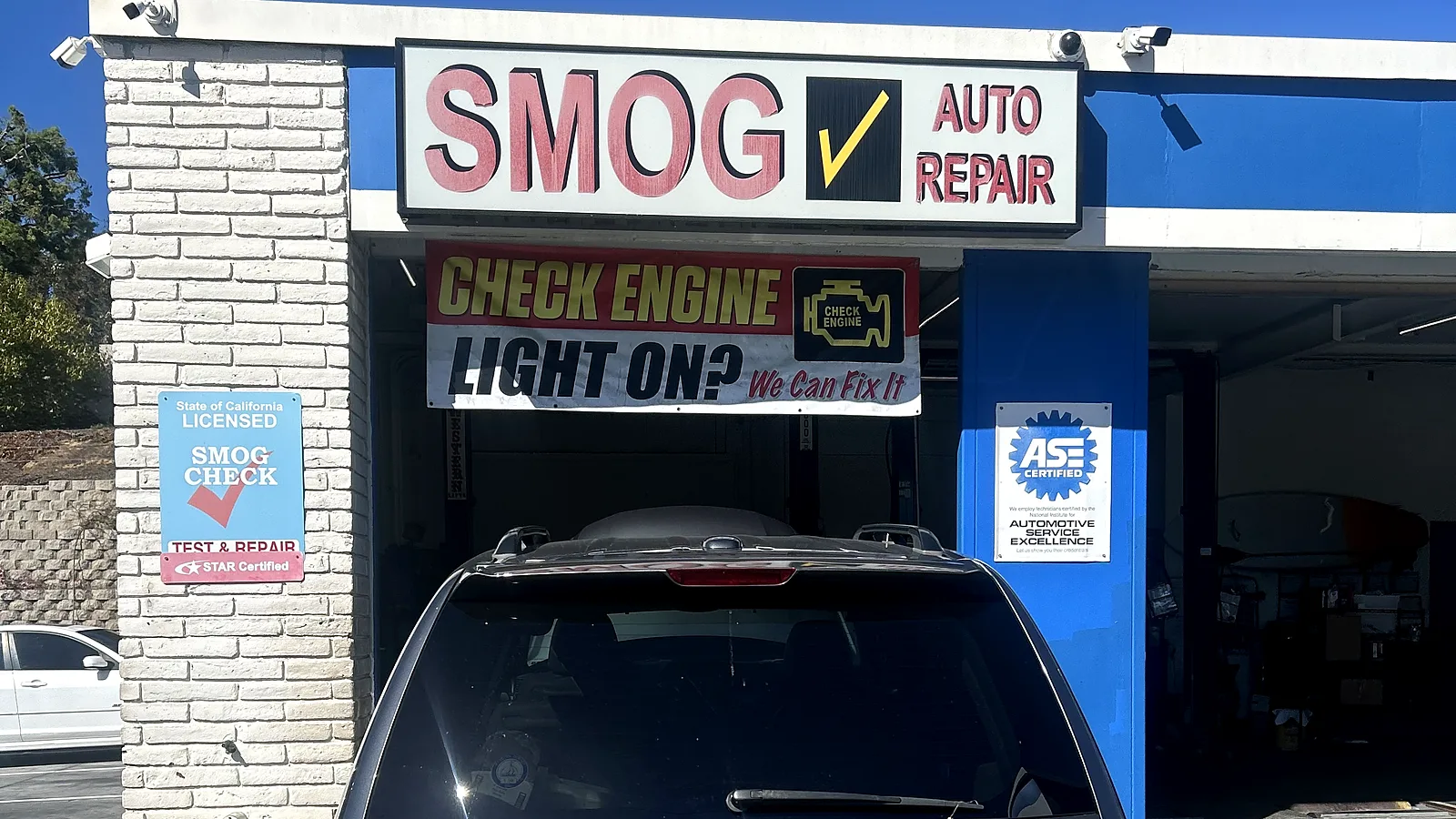 Suspension and steering repair in Encinitas, CA: Honda Odyssey pulled up to our service bay